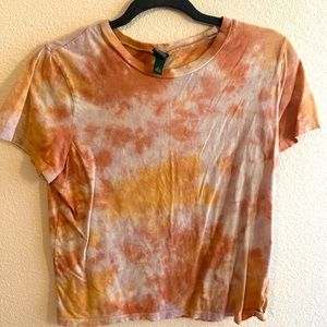 Pink and orange colored tye dye shirt